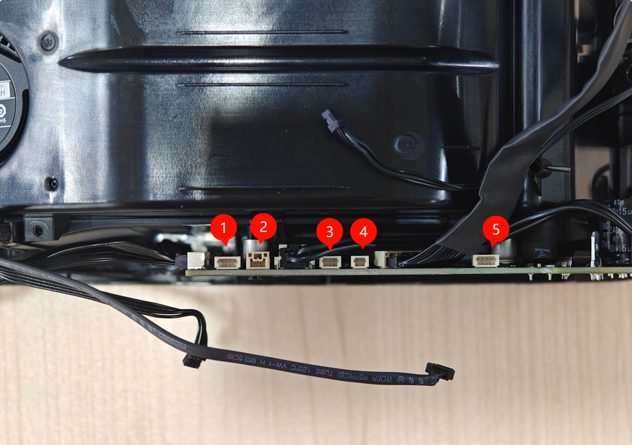 five_cables_at_the_top_of_the_mainboard.jpg
